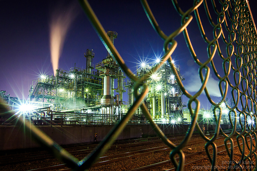 Factory at night with starbursts