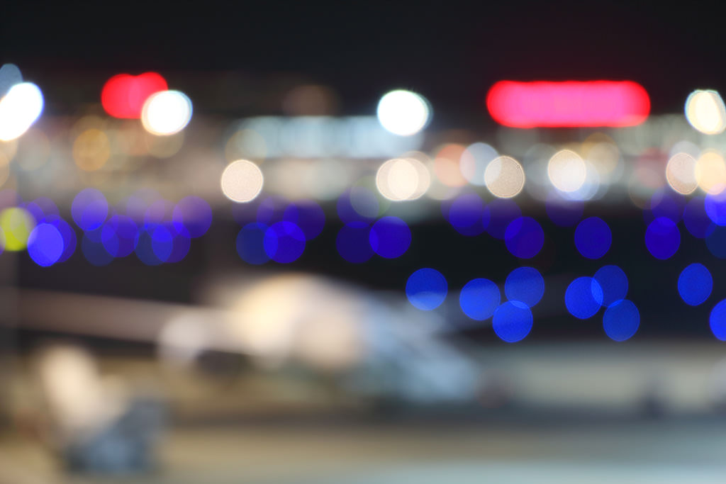 Plane at airport (out of focus)