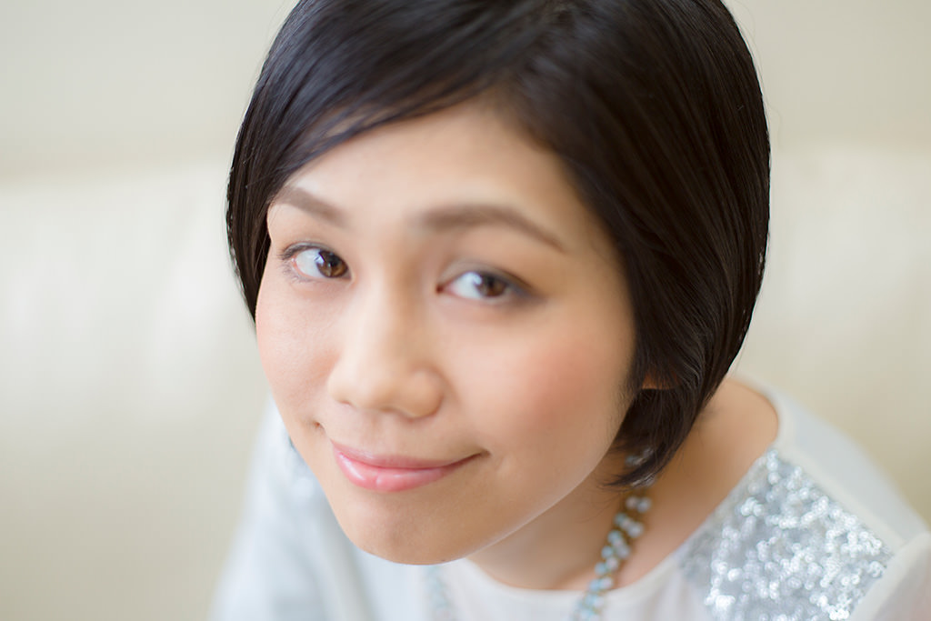 Head shot of lady with front eye blurred