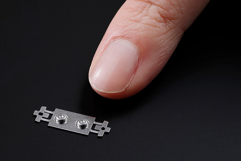 Nano USM next to fingertip