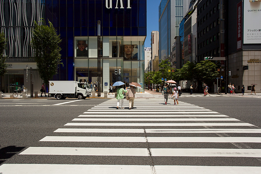 Building in front of zebra crossing, perfectly straight