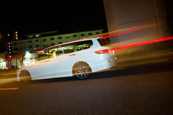 Car with light trails behind