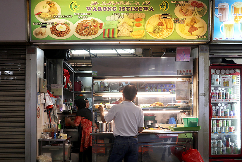 two camera-shy aunts working at the back of the stall