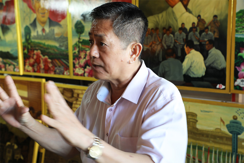 Mr Ang speaking about his art