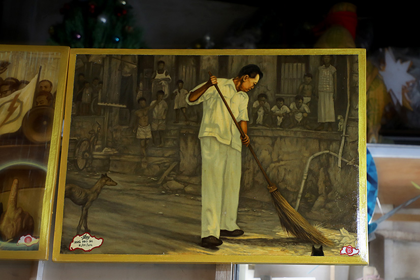 Mr Ang's painting of Mr Lee Kuan Yew sweeping the streets