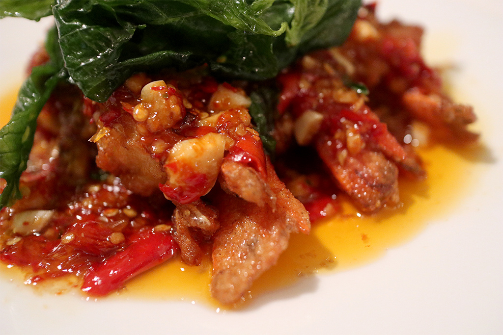 Prawns in chilli sauce with a deep-fried Thai basil topping.