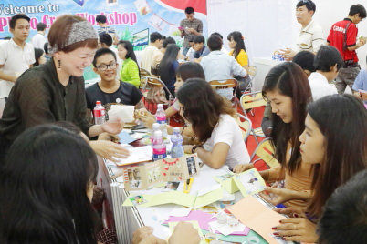 Participants working on the Bellows Photo Card