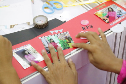 Working on the Bellows Photo Card (closeup)