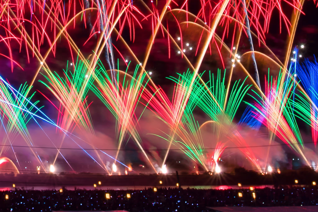 fireworks launched at an oblique angle from one another