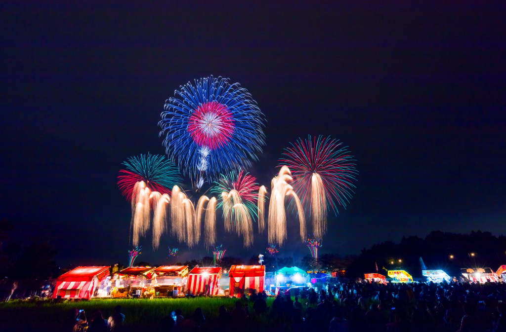 A series of fireworks captured in the same frame