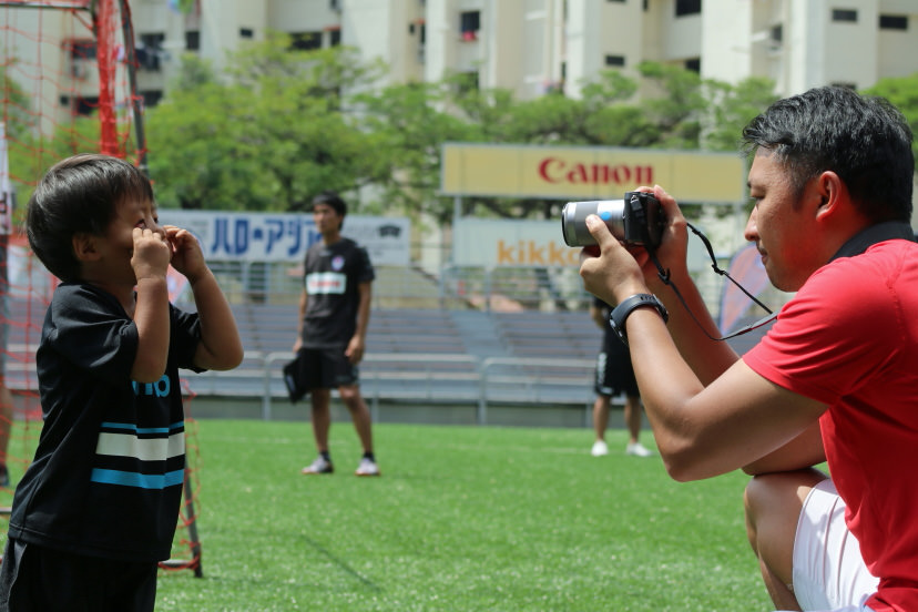 Parent photographing child