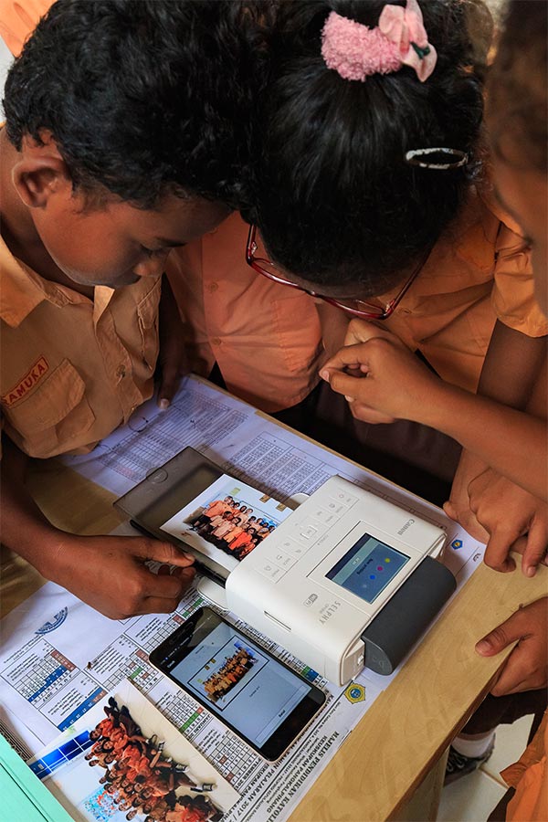  selphy cp1300 compact photo printer in school usage 