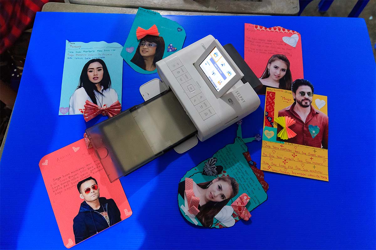 selphy cp1300 compact photo printer in school usage