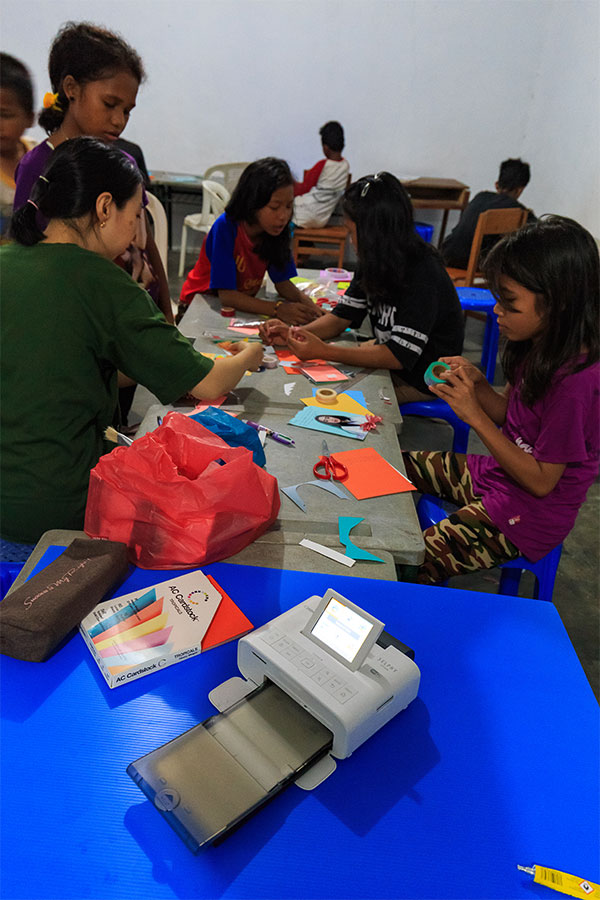  selphy cp1300 compact photo printer in school usage 