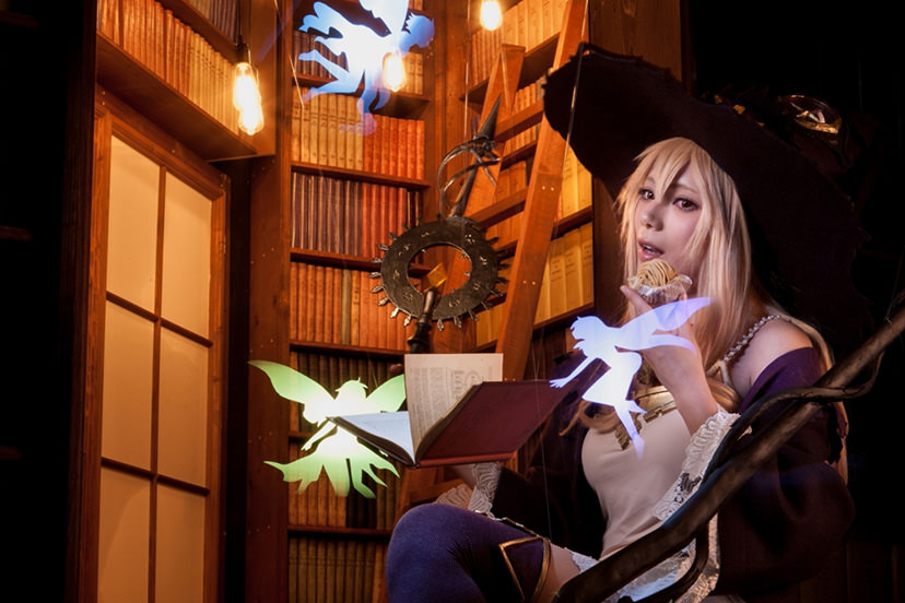 Cosplay witch with fairies