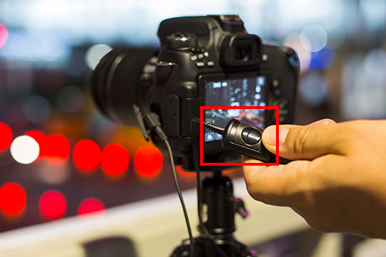 Use the remote switch to release the shutter