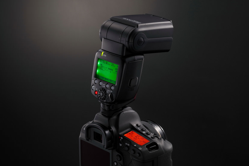 external flash attached to a canon DSLR camera
