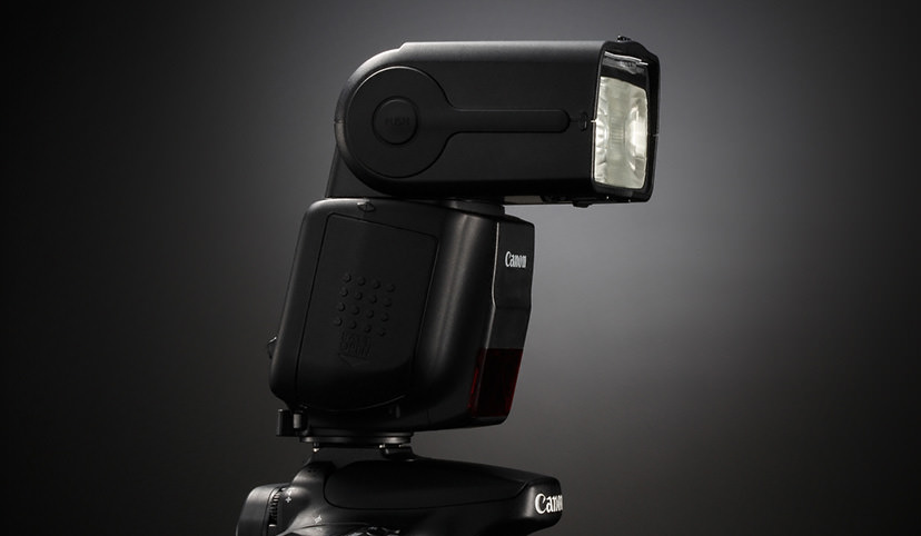 Adjust the angle of the flash head