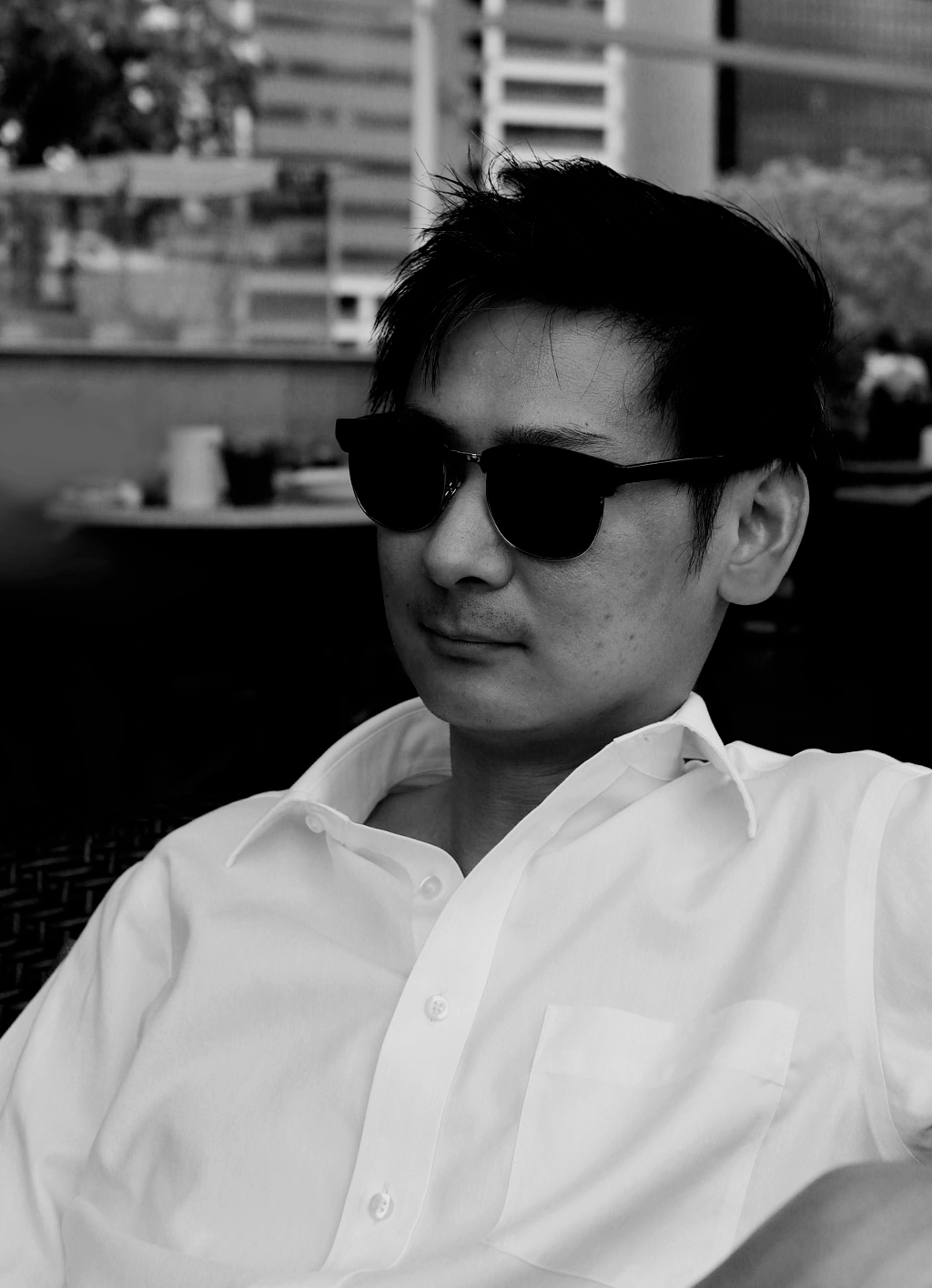 black and white photo of a male with sunglasses using EOS M5