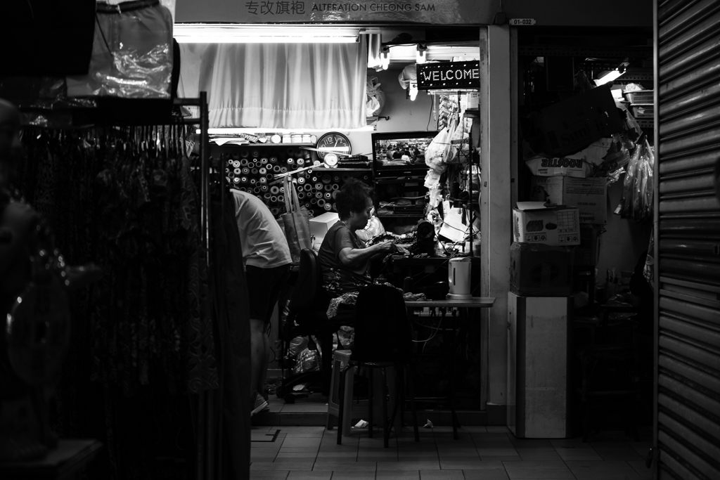 black and white lady in a shop