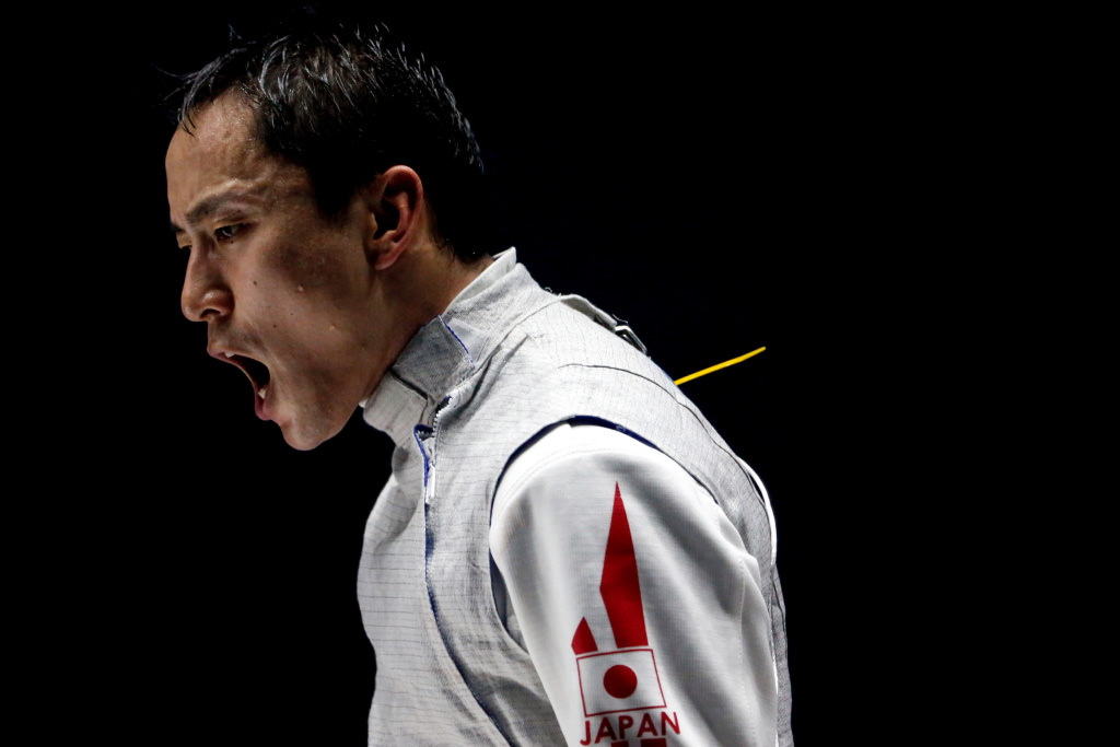 Close up of shouting fencer