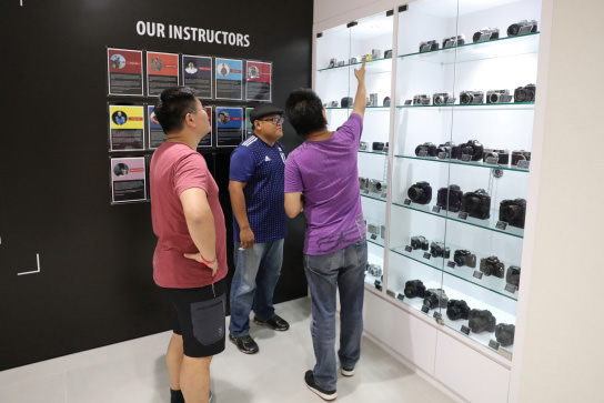 Looking at old cameras on display at Canon Singapore