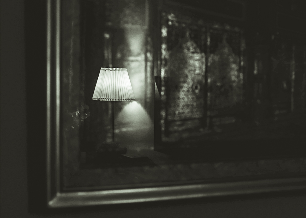 black and white reflection of lamp