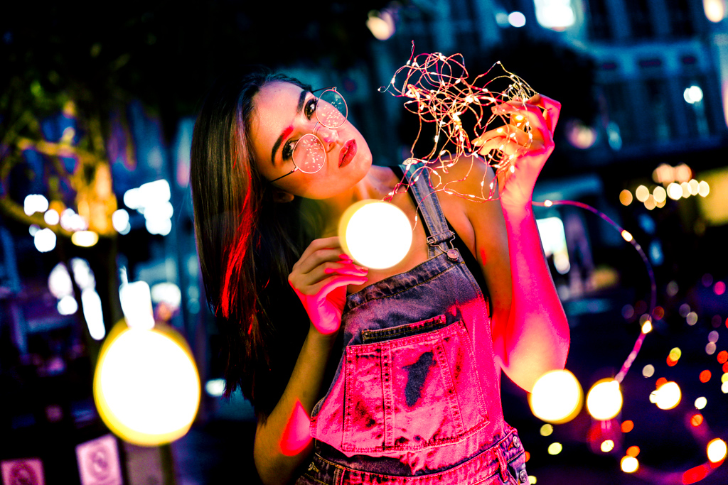 female with spectacles fairy lights