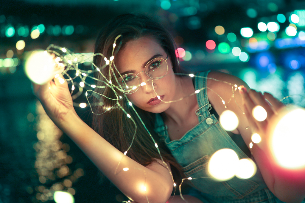 night portrait female model with street light bokeh