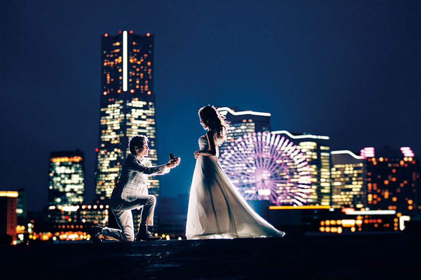 Night wedding portrait against Yokohama cityscape