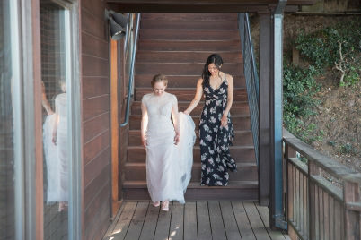 Bride walks down stairs
