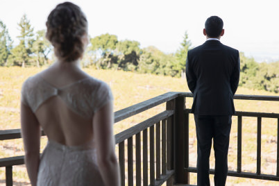 Bride approaches groom (focus on groom) 