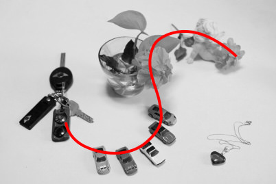 Small objects arranged in S shape (illustration)