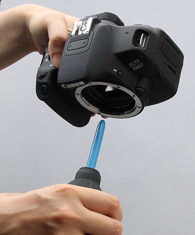 Cleaning sensor with a blower