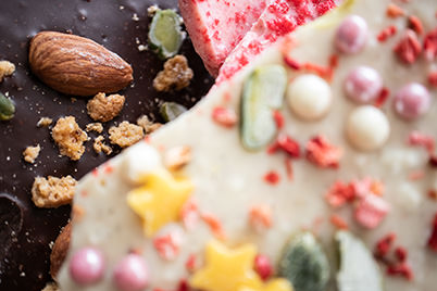 Decorated chocolate bar with decorations out of focus