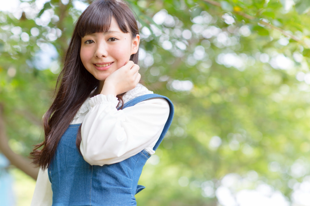 Portrait of girl against background bokeh