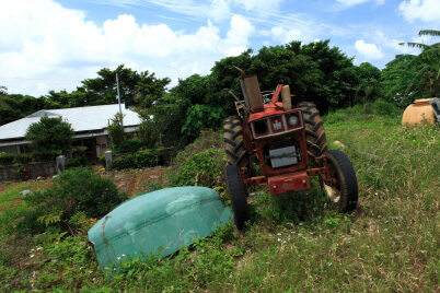 Tractor and shovel side by side