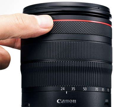 Hand turning RF lens control ring