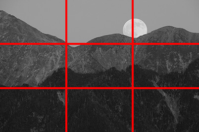 Mountains and moon with grid