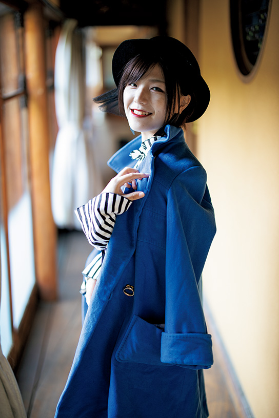 Girl in hat in corridor