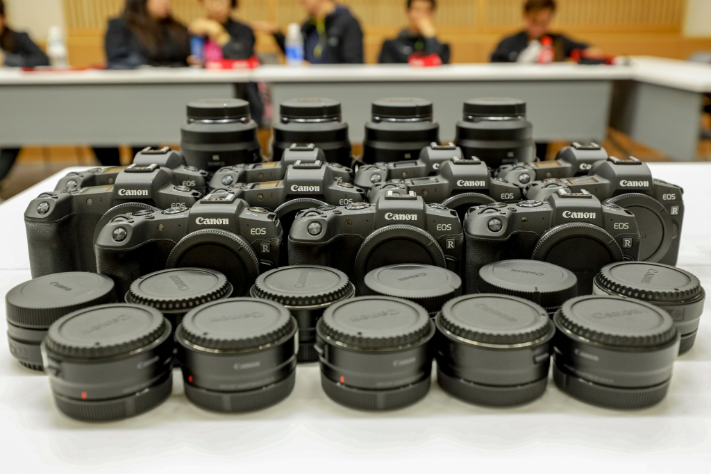 EOS R, EOS RP, mount adapters and lenses on table