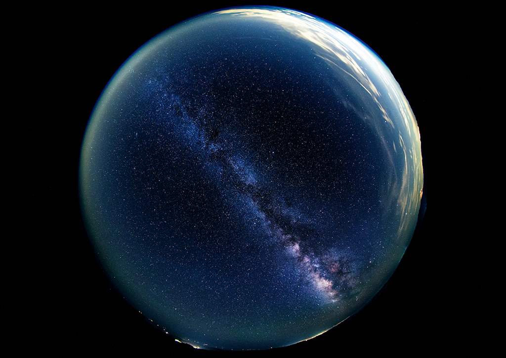 Circular fisheye shot of Milky Way in straight line