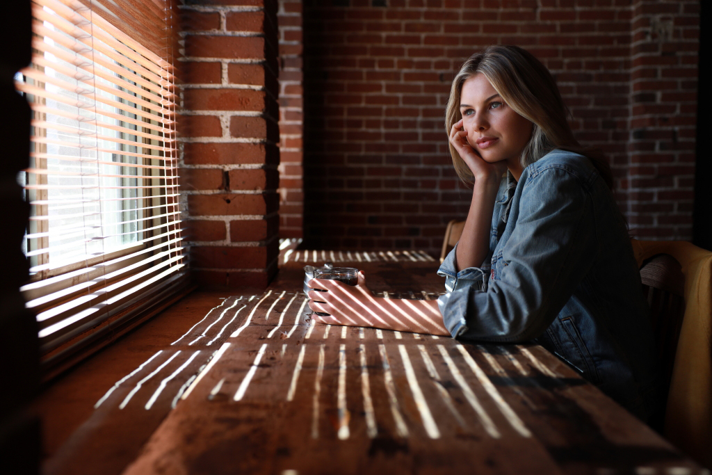 Portrait of lady in dim room