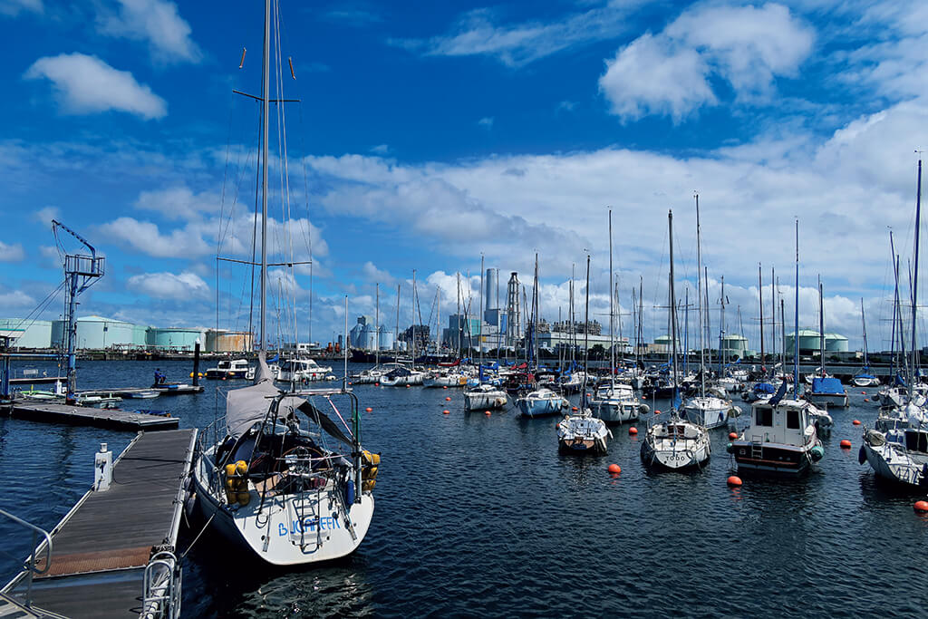 Boats docked at harbour