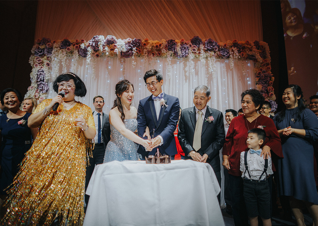 Cake-cutting ceremony at a wedding
