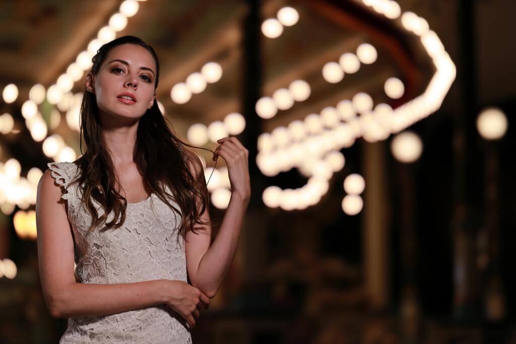 Portrait with velvety bokeh lights in the background