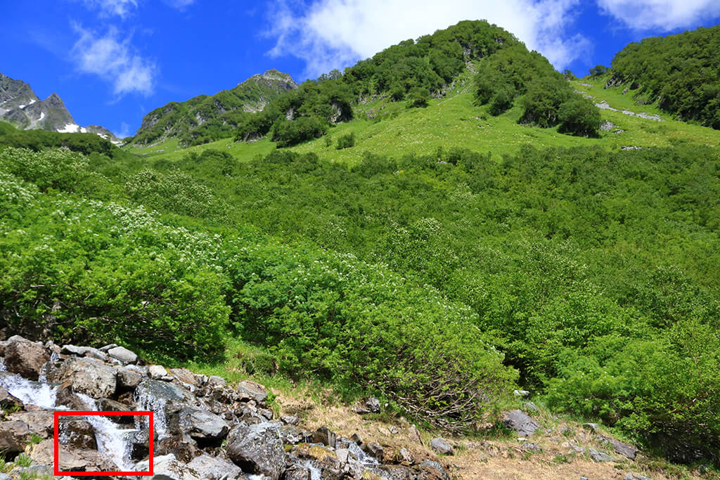 Stream in front of mountains