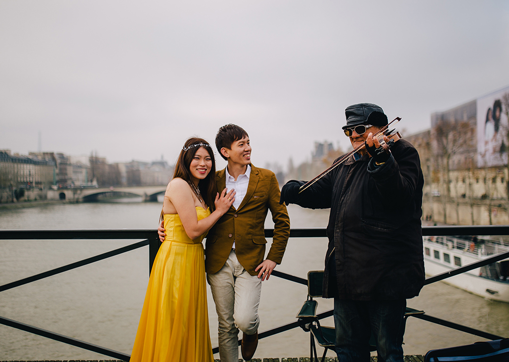 Couple enjoying music by the river