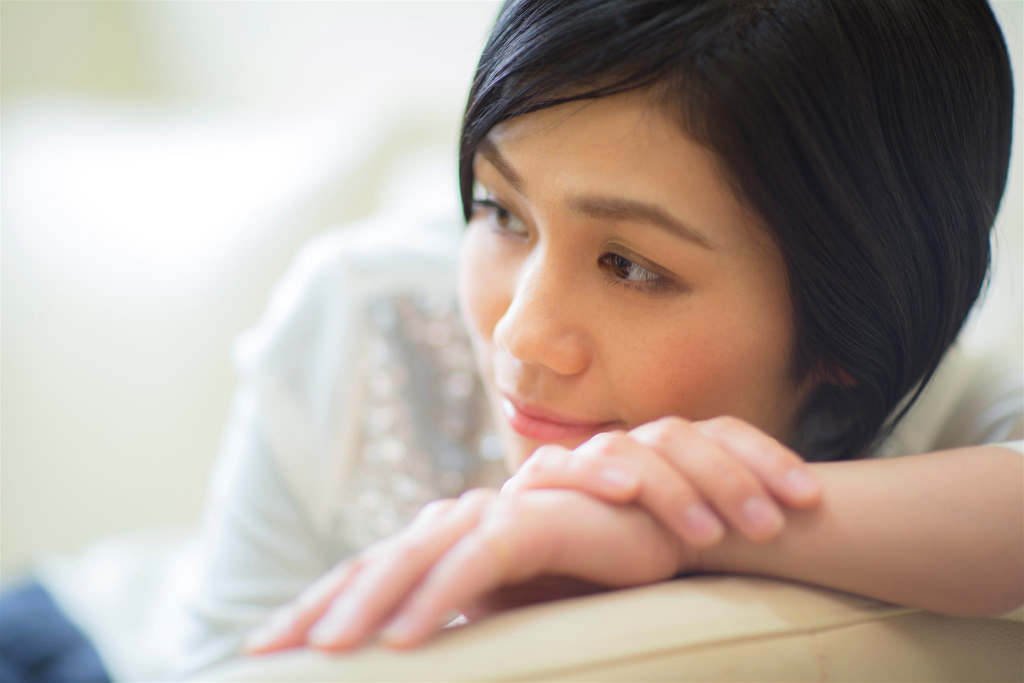 Close-up portrait of lady with front eye blurred