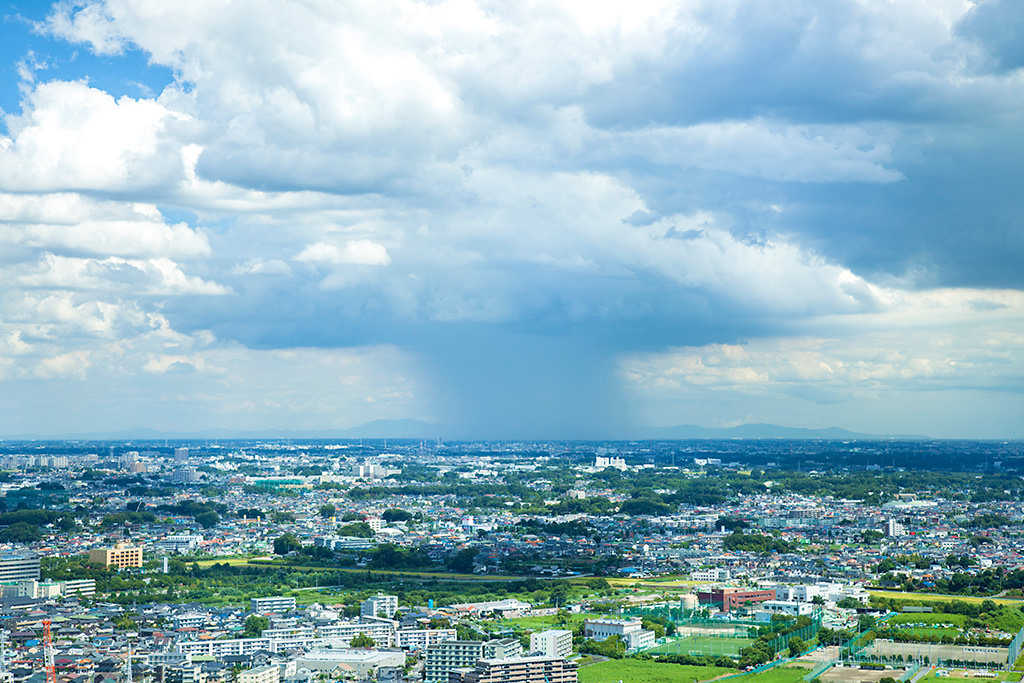 Panorama of storm over town